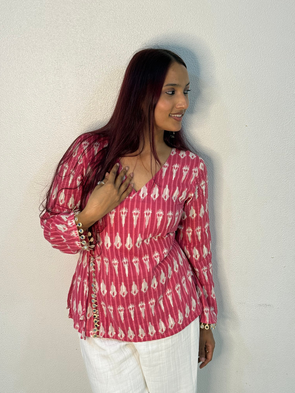 Bright pink ikkat top with mirror lace detailing