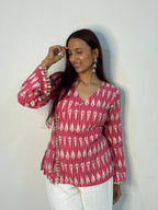 Bright pink ikkat top with mirror lace detailing