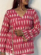 Bright pink ikkat top with mirror lace detailing