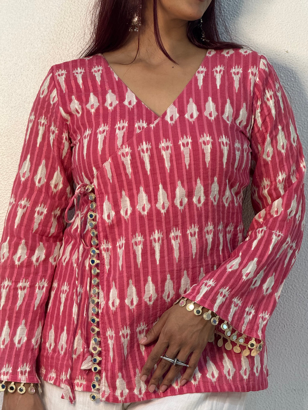 Bright pink ikkat top with mirror lace detailing