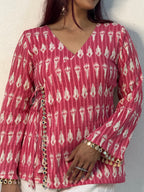 Bright pink ikkat top with mirror lace detailing
