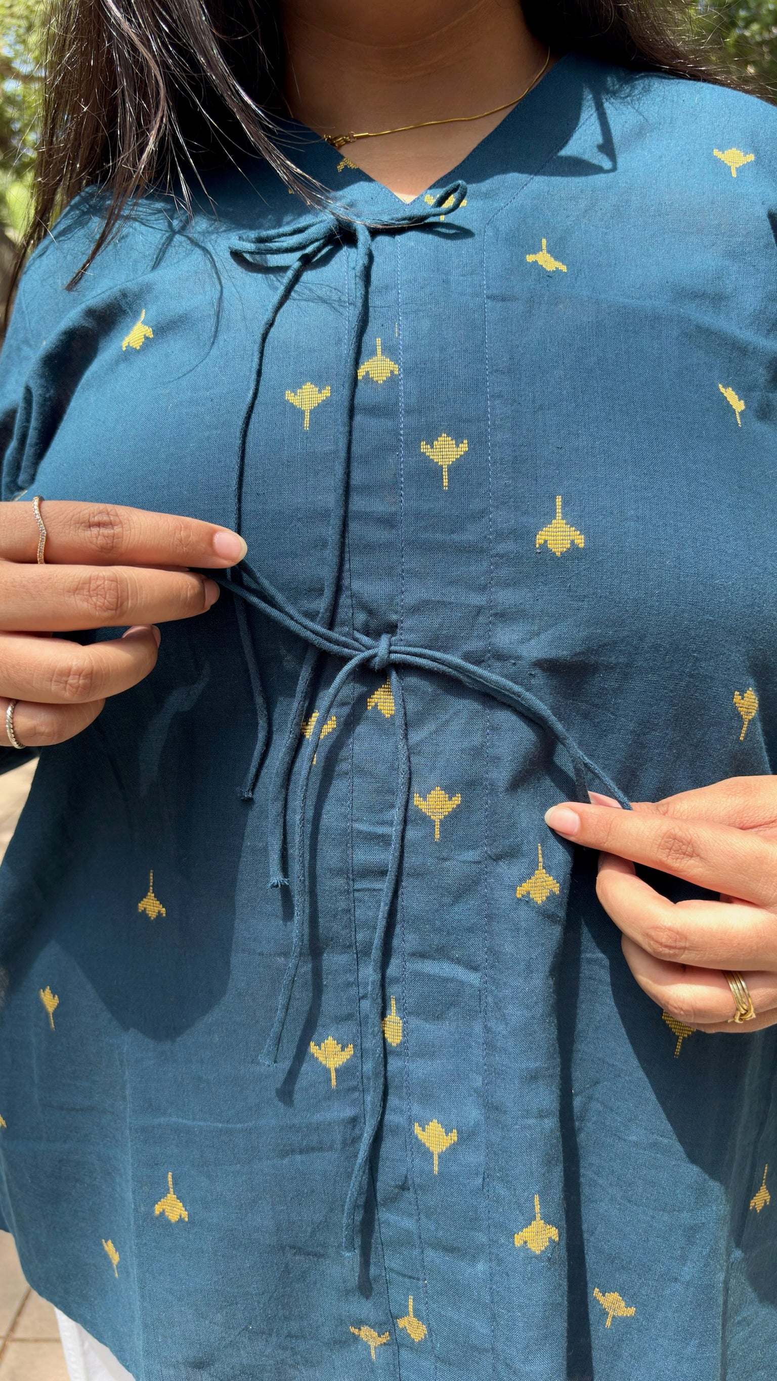 Handloom doby top with bow detailing